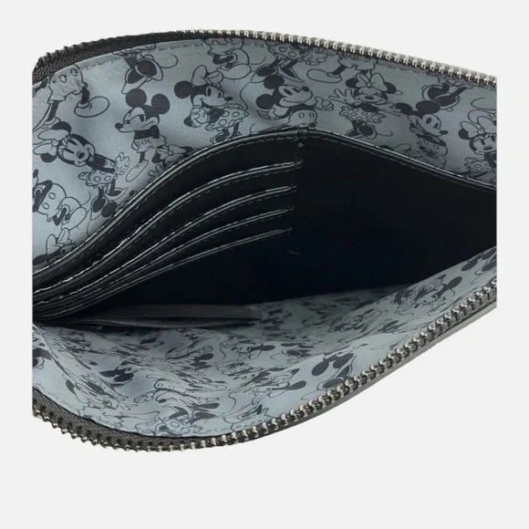 Loungefly Disney Mickey & Minnie
Silhouette Allover Embossed Wristlet
Pouch NWT - Picture 7 of 8